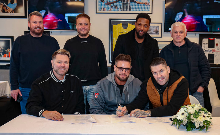 Boyzone and Westlife return to Chorley FC to sign on the dotted line